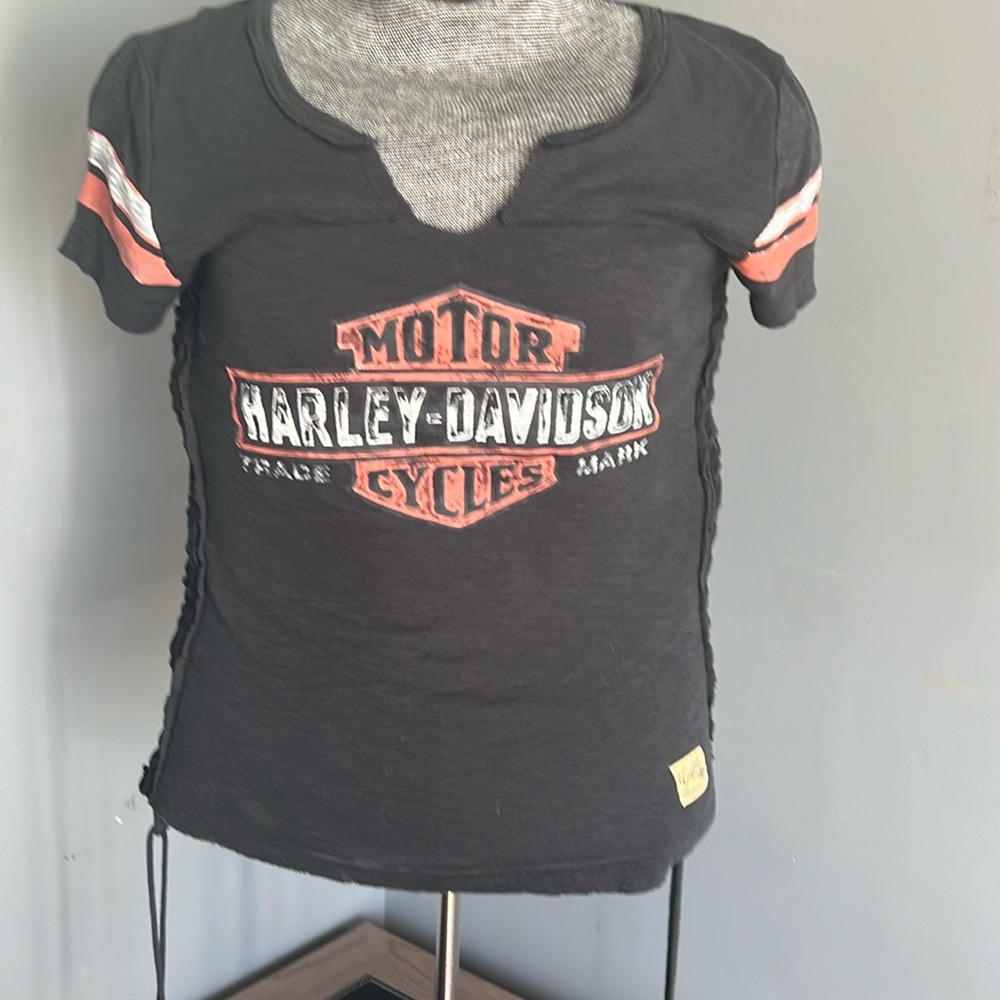 Harley Davidson women’s medium short sleeve with ties down the side.